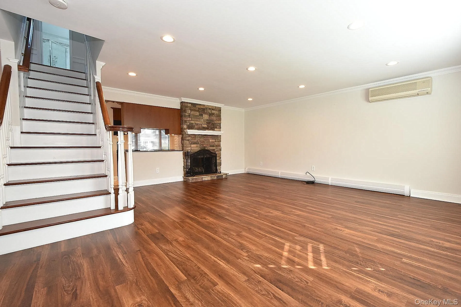 Den with engineered wood floors & recessed lights Den with engineered wood floors & recessed lights
