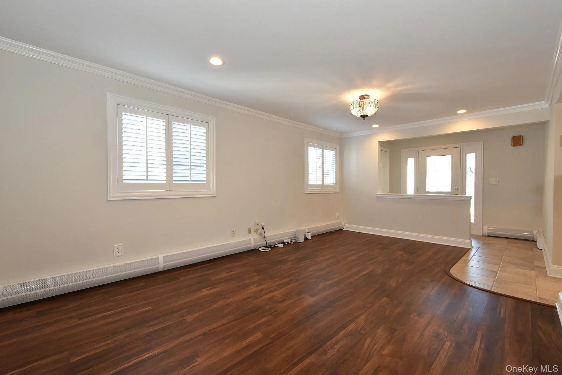 Entry Foyer & Living Room with plantation shutters Entry Foyer & Living Room with plantation shutters
