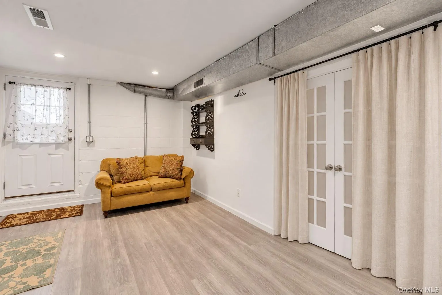 Virtually Edited Recreation Room with outside entrance. Virtually Edited Recreation Room with outside entrance.
