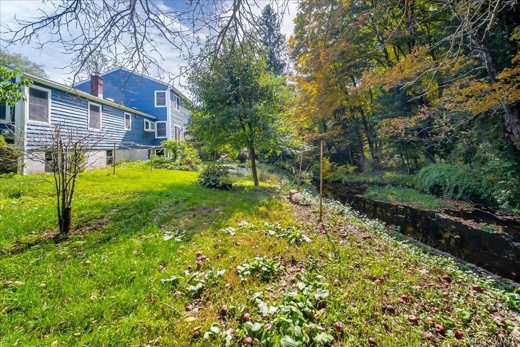 View of Exterior of home with water stream View of Exterior of home with water stream