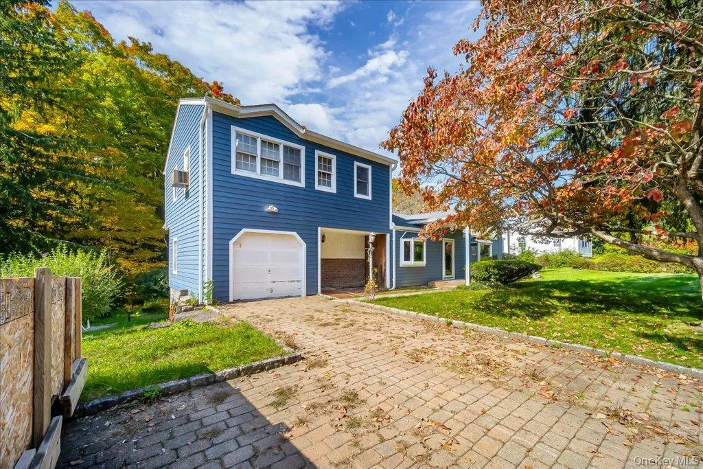 Actual front photo of property with trees Actual front photo of property with trees