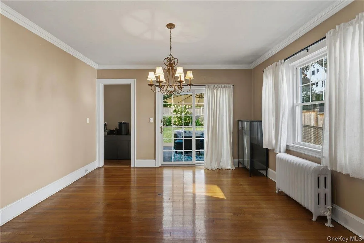 With SGD to deck and yard, looking into pantry area With SGD to deck and yard, looking into pantry area