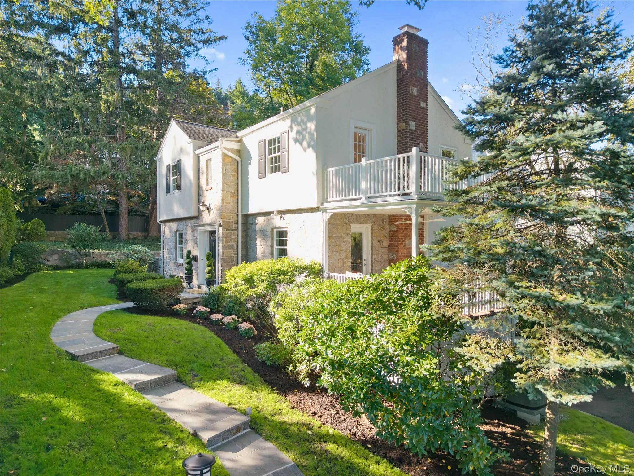 the right side of the home has 2 balconies. One on the main level near the living room and one on the 2nd floor. the right side of the home has 2 balconies. One on the main level near the living room and one on the 2nd floor.