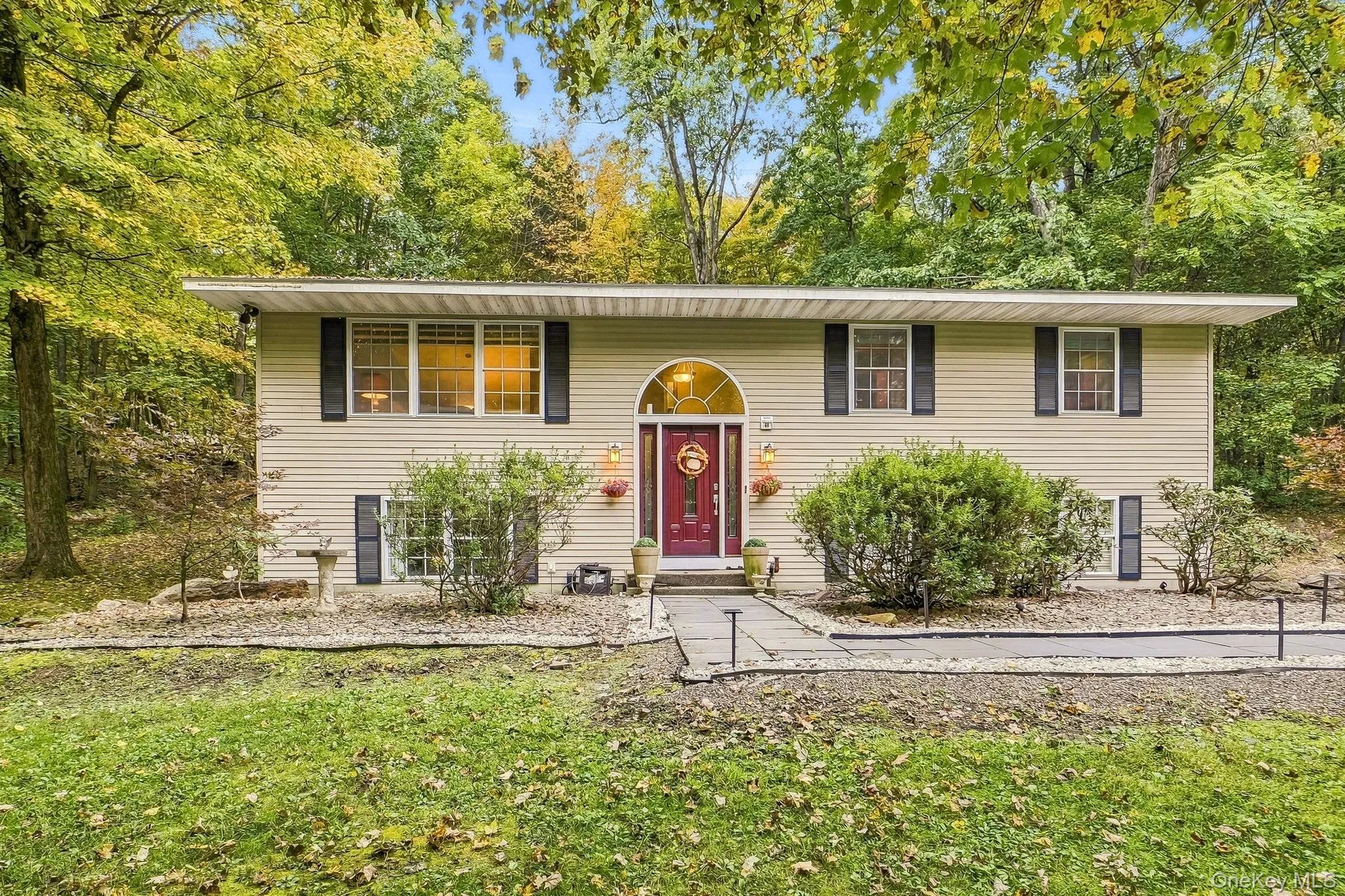 Home sits in a picturesque setting. Home sits in a picturesque setting.
