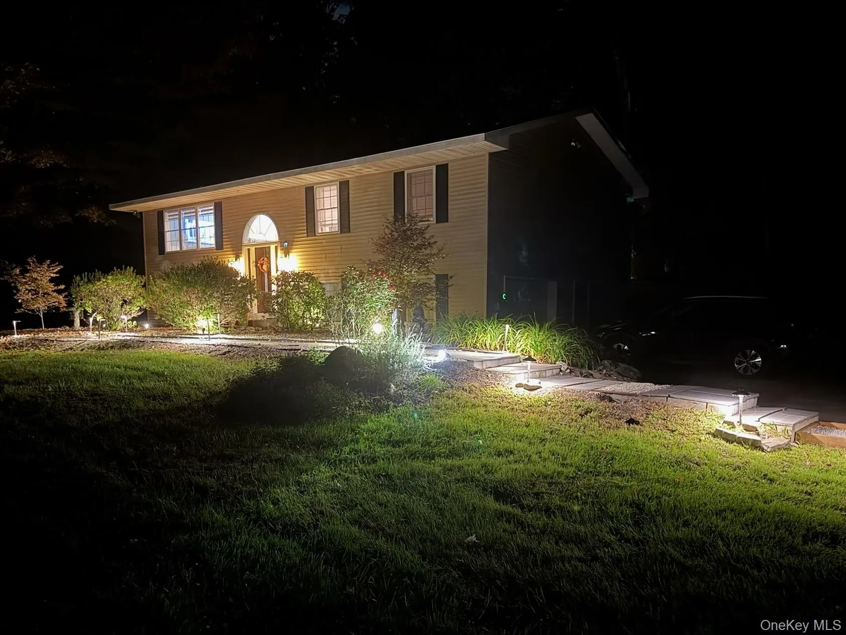 Exterior lighting in the evening amplifies the peaceful setting Exterior lighting in the evening amplifies the peaceful setting