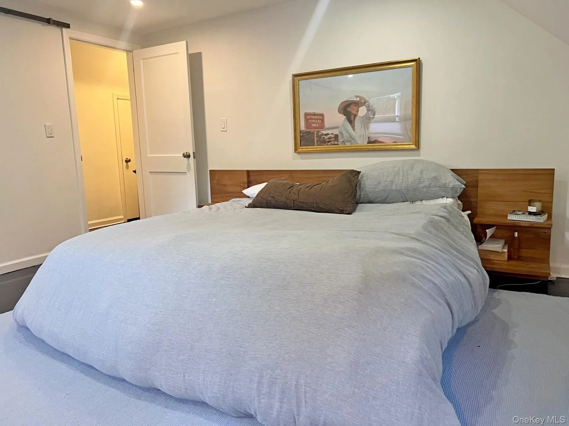 Large primary bedroom with wall to wall closet. Large primary bedroom with wall to wall closet.