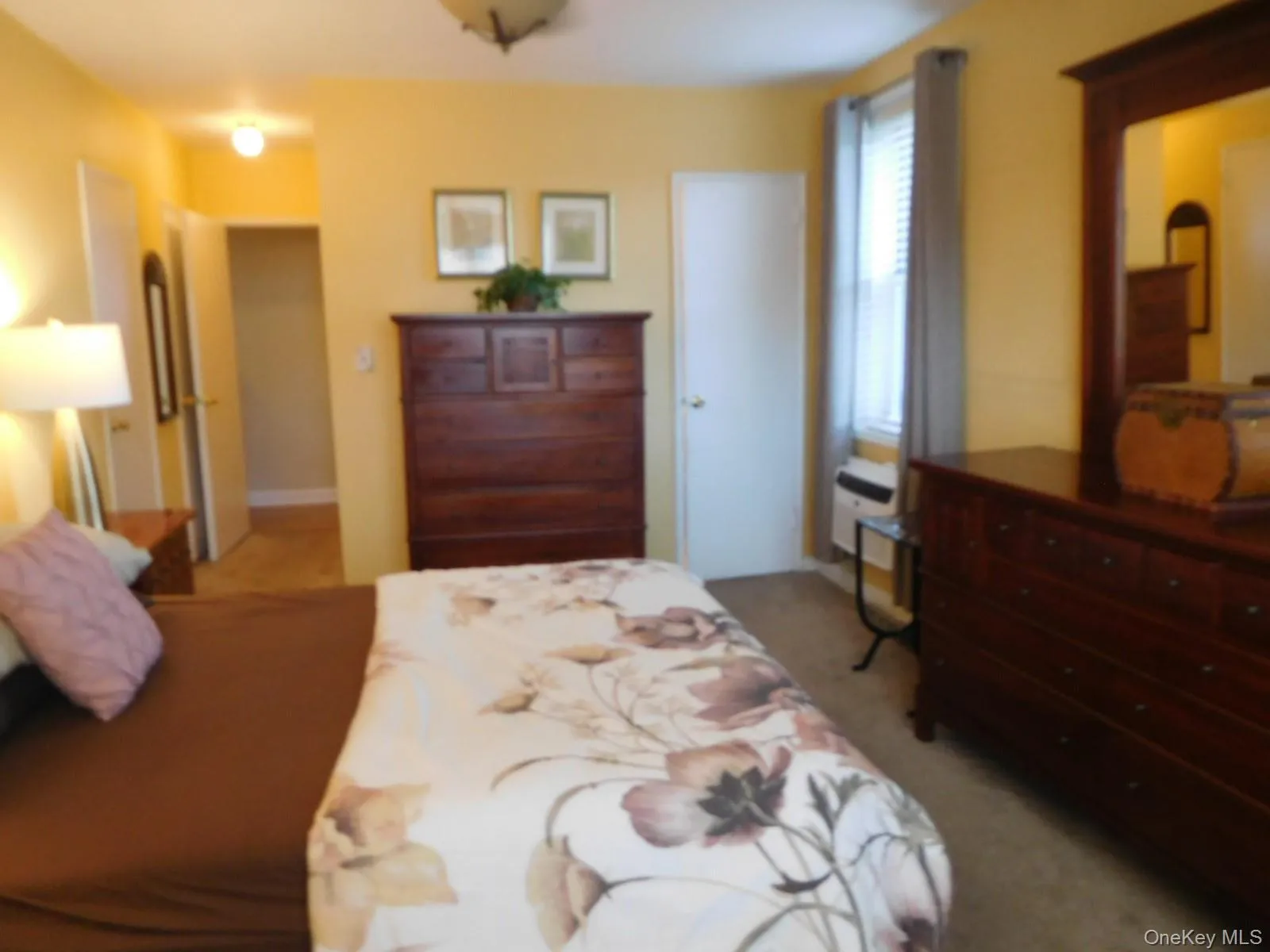 Opposite view of Primary with Bath behind white door Opposite view of Primary with Bath behind white door