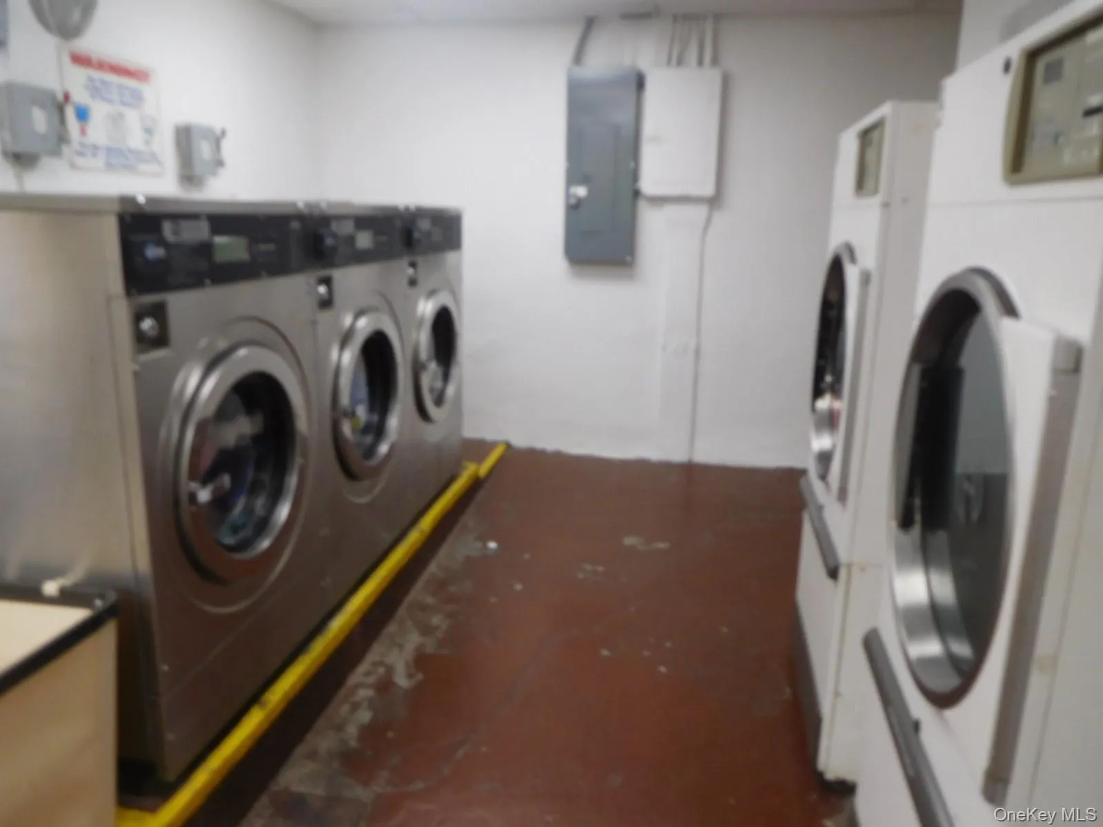 Laundry Room located in bright Basement Laundry Room located in bright Basement