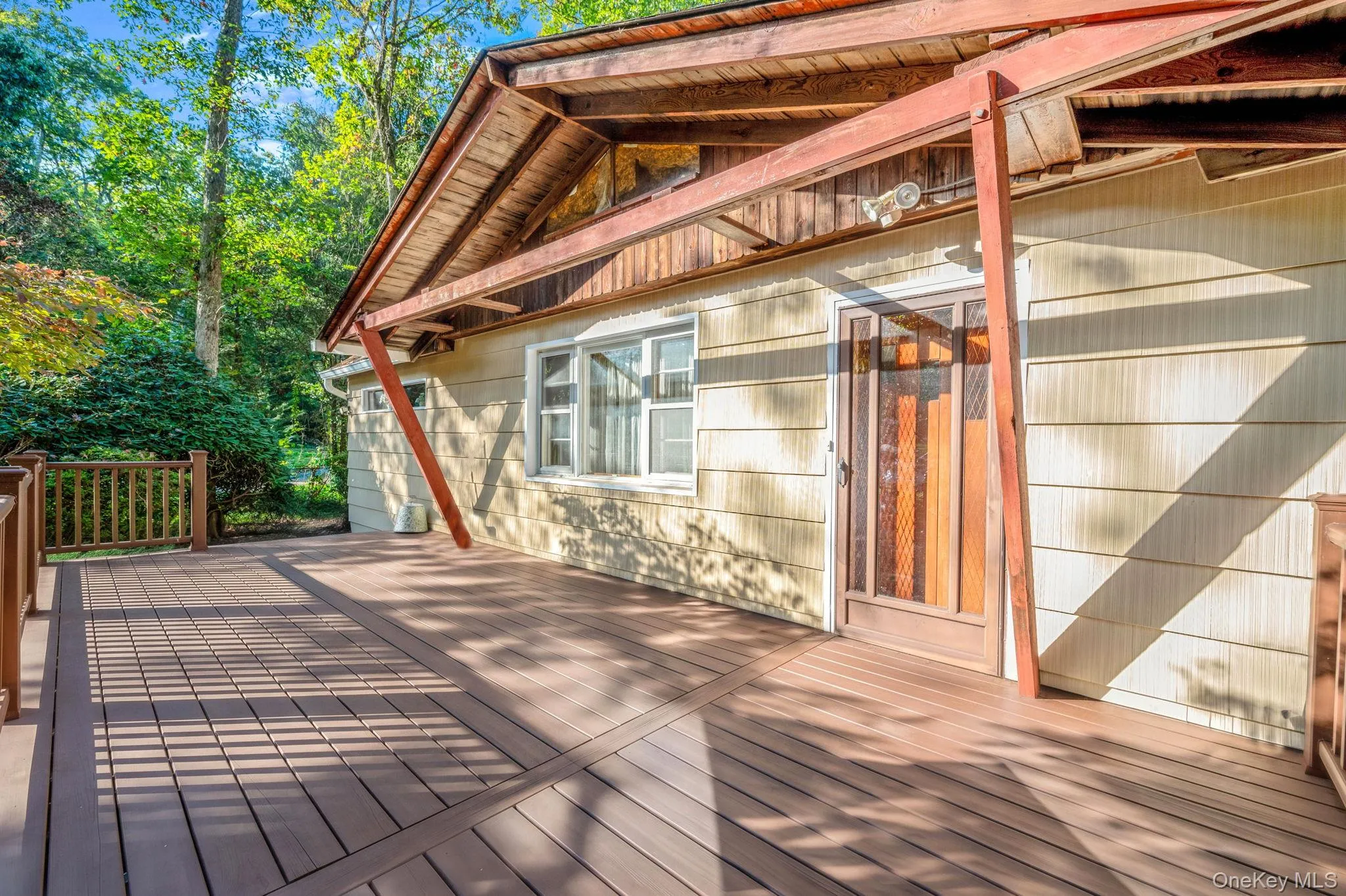 expansive deck over looking the beautiful front yard expansive deck over looking the beautiful front yard