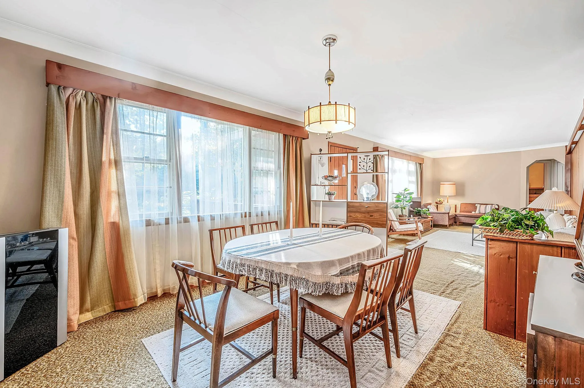 Bright dining area open to living room Bright dining area open to living room