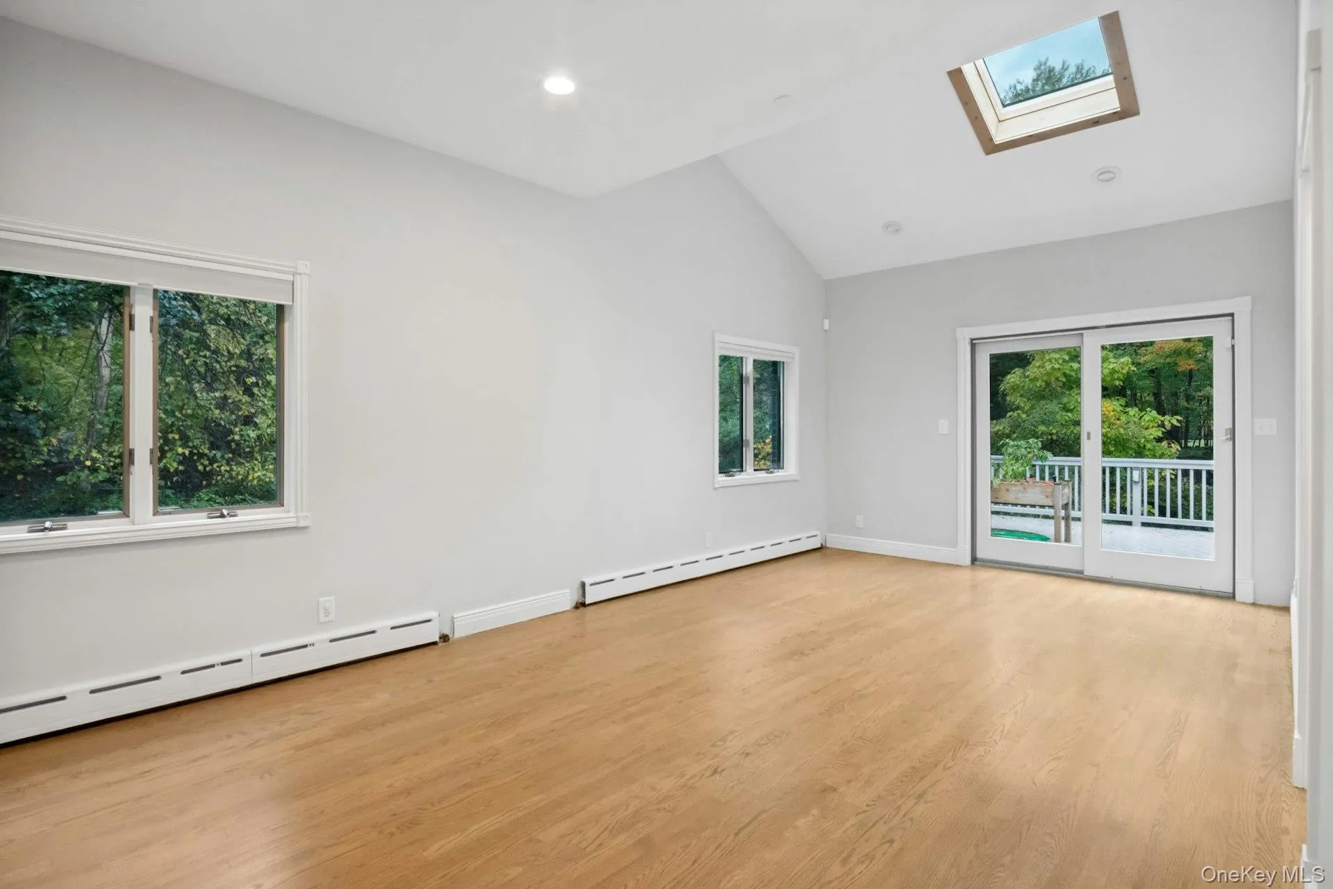 Primary bedroom with tons of natural light. Primary bedroom with tons of natural light.