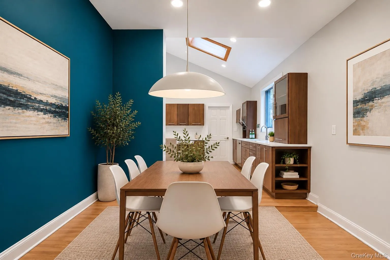 Virtually staged dining area. Virtually staged dining area.