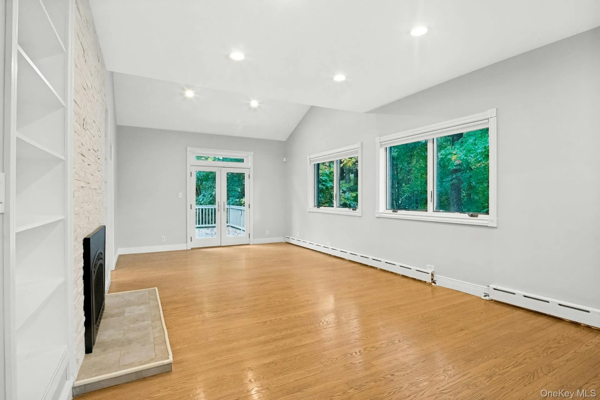Vaulted ceiling and French doors to deck. Vaulted ceiling and French doors to deck.