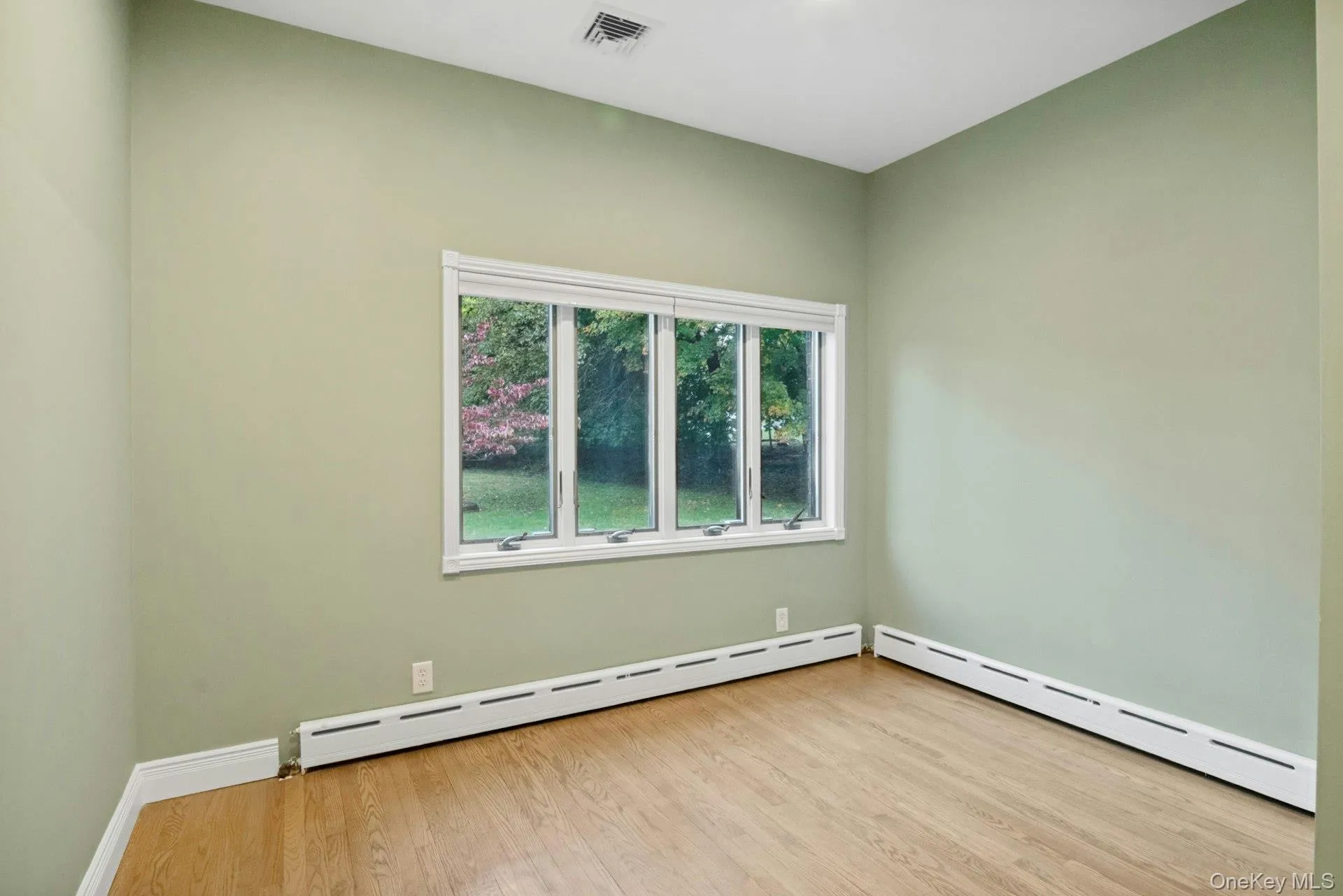 Bedroom #2 with large windows. Bedroom #2 with large windows.