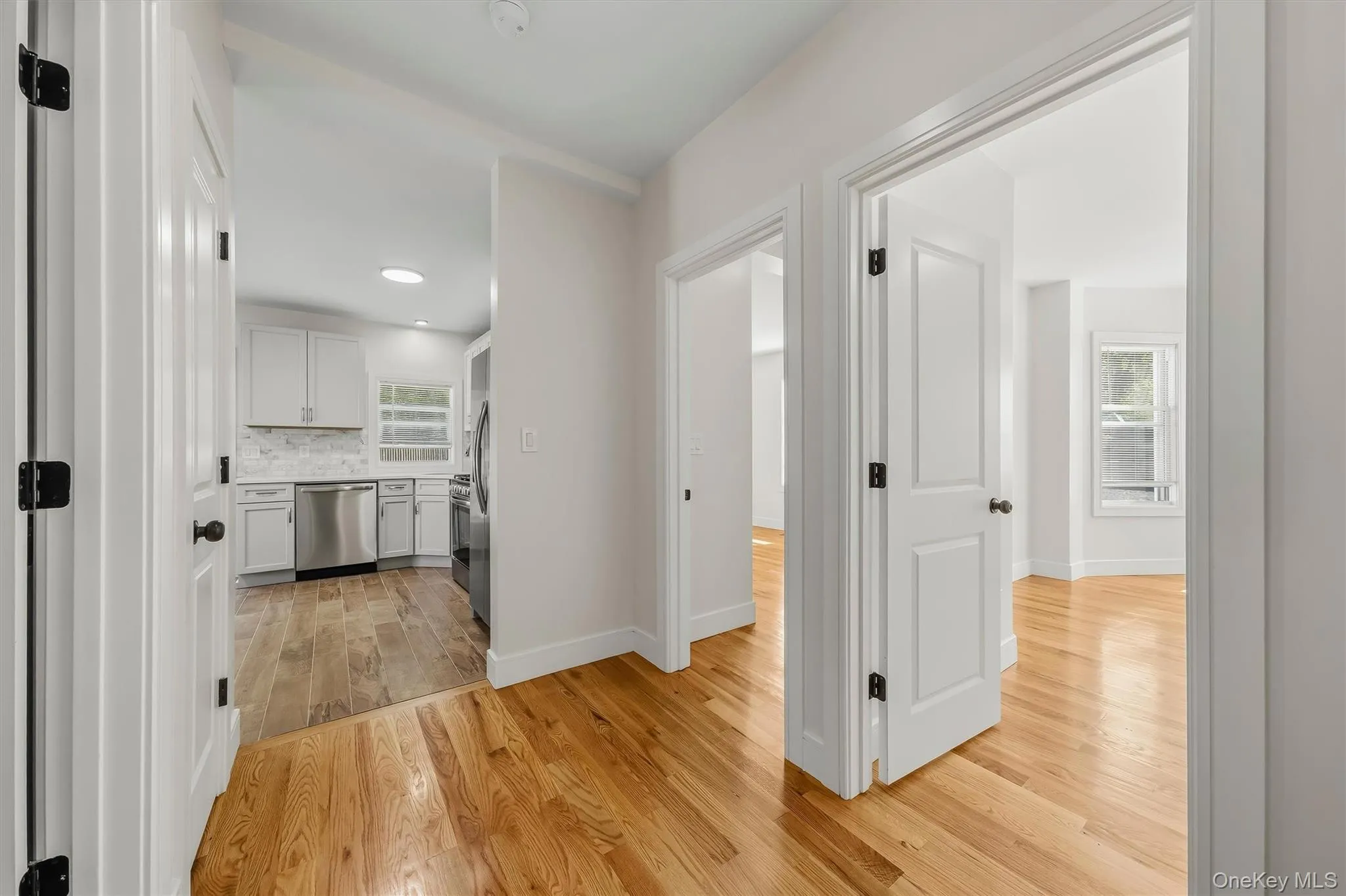 Wood-finish flooring throughout, white interior doors, and crisp white trim Wood-finish flooring throughout, white interior doors, and crisp white trim