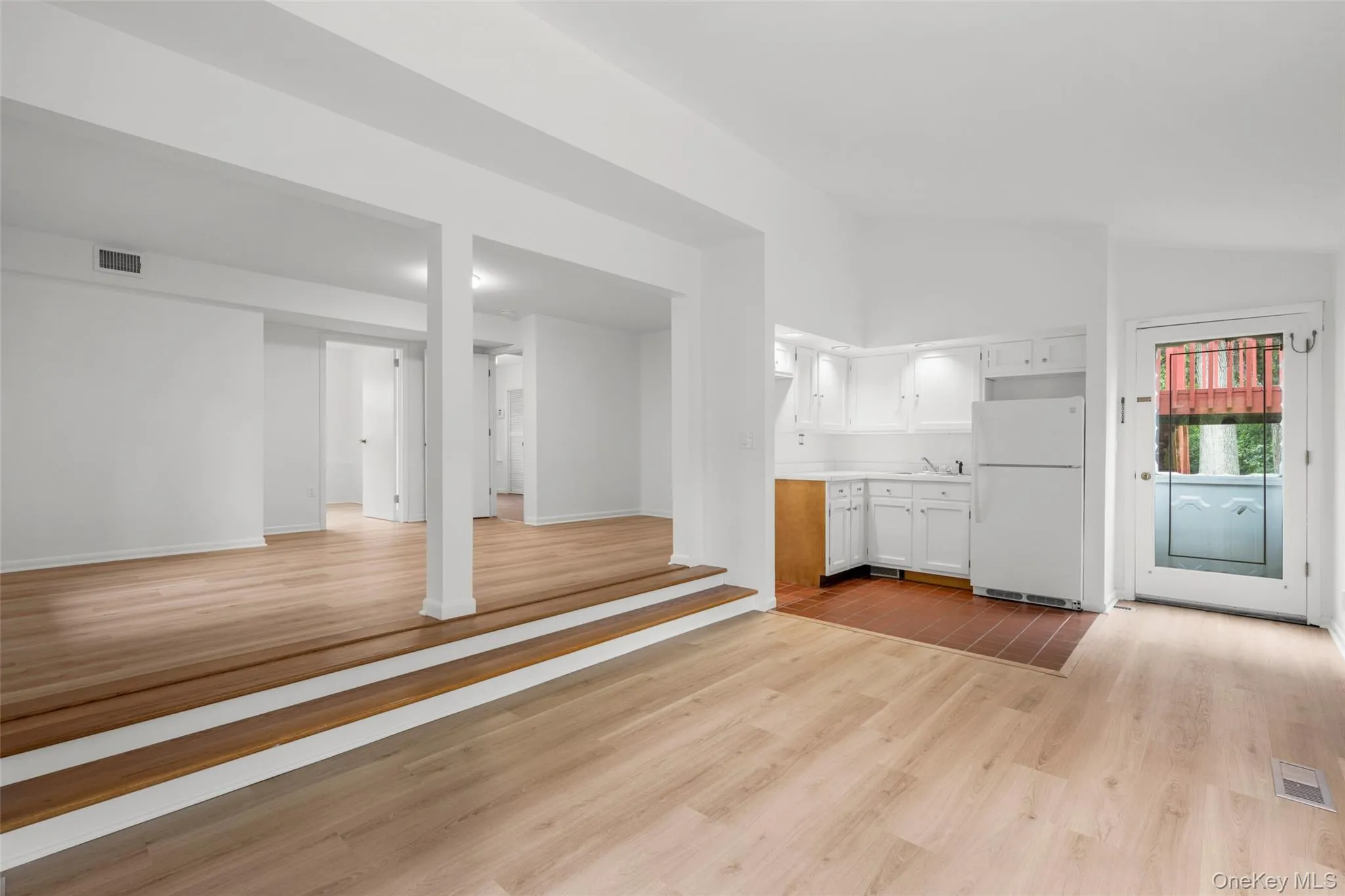 Secure access to/from laundry room & the garage or via the rear yard. Secure access to/from laundry room & the garage or via the rear yard.