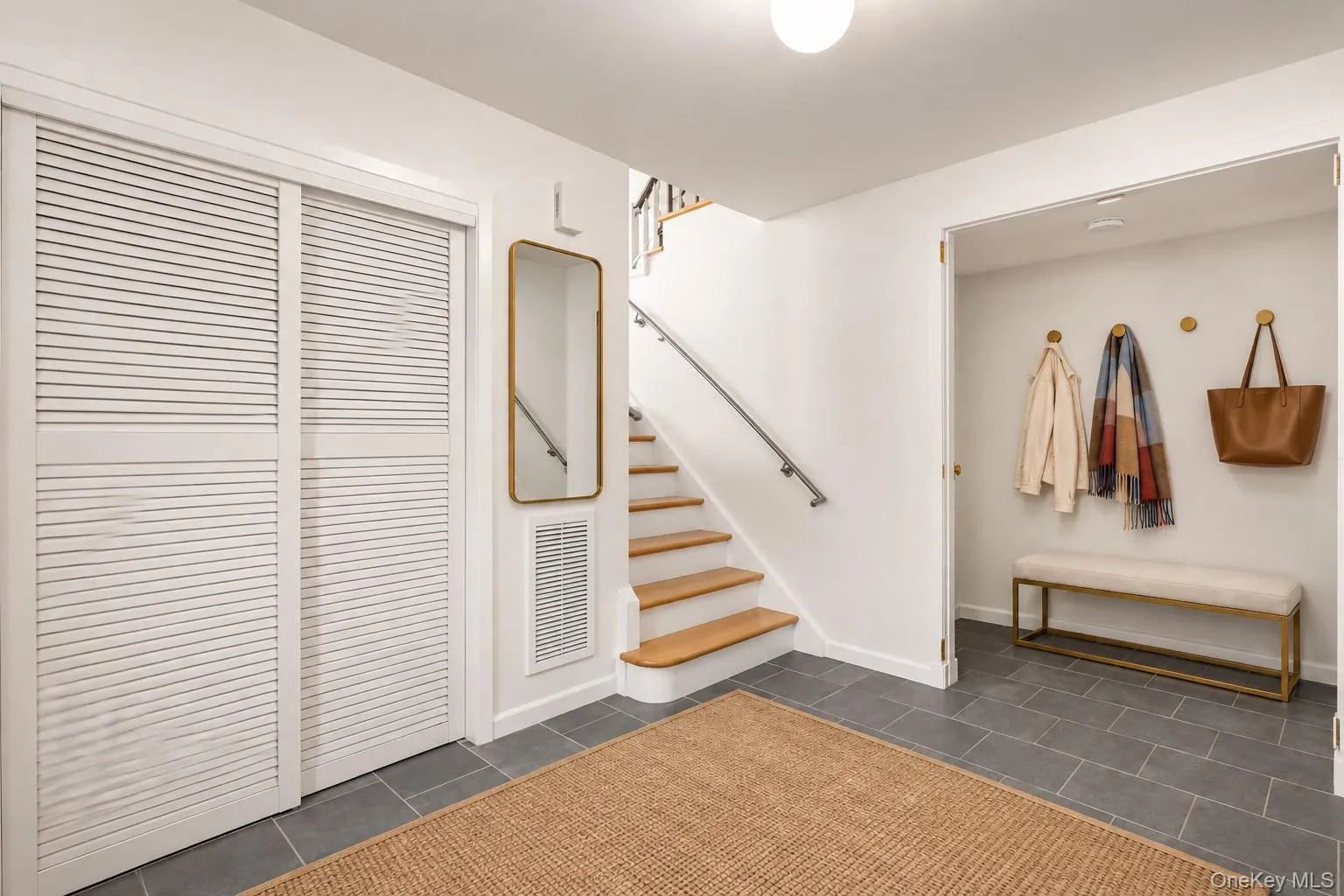 Step inside to a spacious, newly tiled foyer. Step inside to a spacious, newly tiled foyer.
