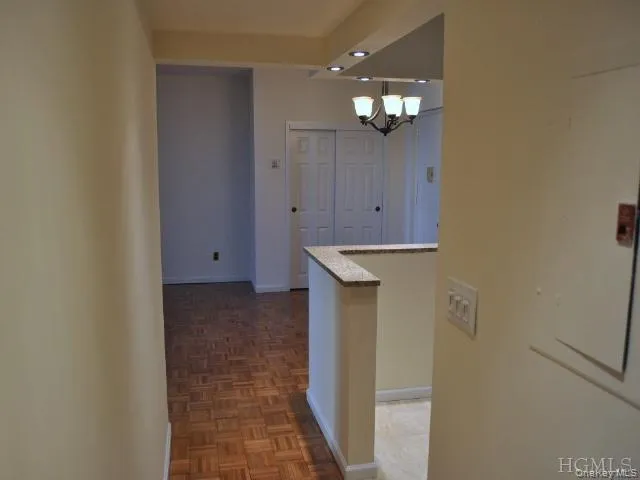 Hallway from bedroom and bath to living room Hallway from bedroom and bath to living room