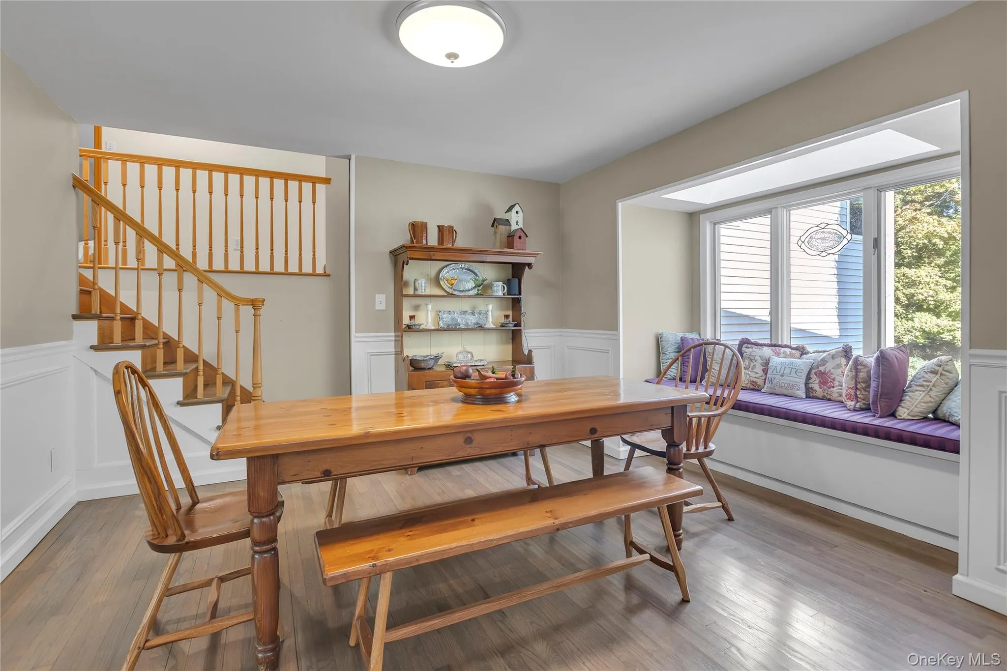 Window Set Overlooking Backyard. Staircase to upper and lower level. Window Set Overlooking Backyard. Staircase to upper and lower level.