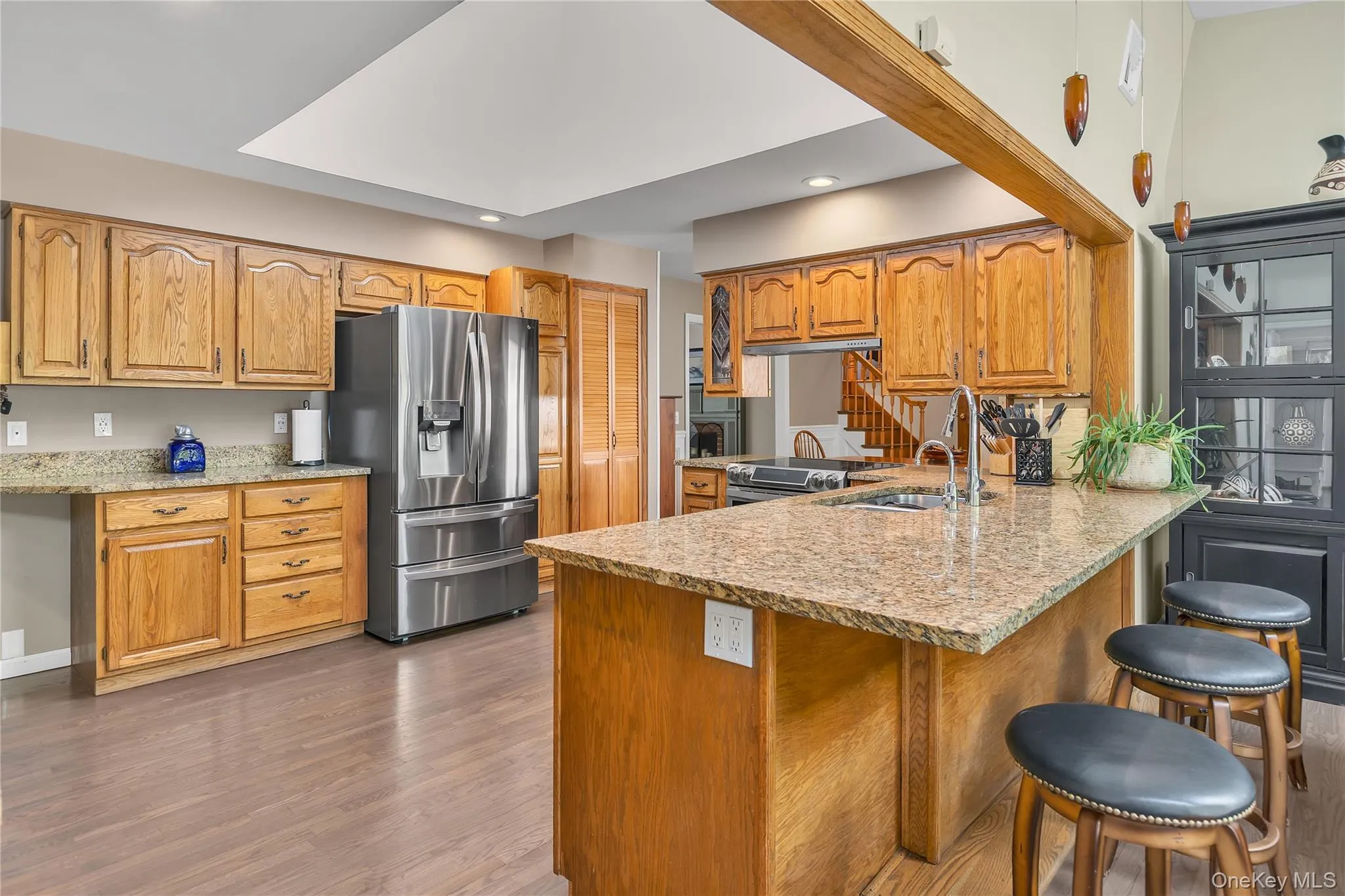 Granite Countertops, SS Appliances, Breakfast Bar, Wet Bar, Beverage Cooler, Double Sink, Skylight, Hi Hats, Pantry, Utility Closet Granite Countertops, SS Appliances, Breakfast Bar, Wet Bar, Beverage Cooler, Double Sink, Skylight, Hi Hats, Pantry, Utility Closet