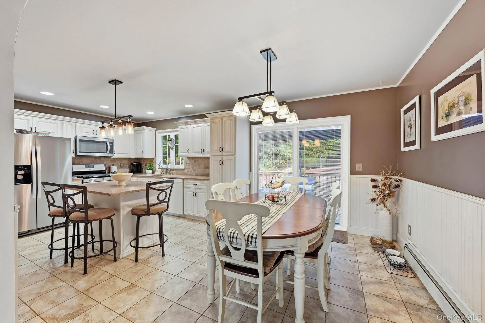 A beautifully updated kitchen combines style, functionality and generous workspace. A beautifully updated kitchen combines style, functionality and generous workspace.