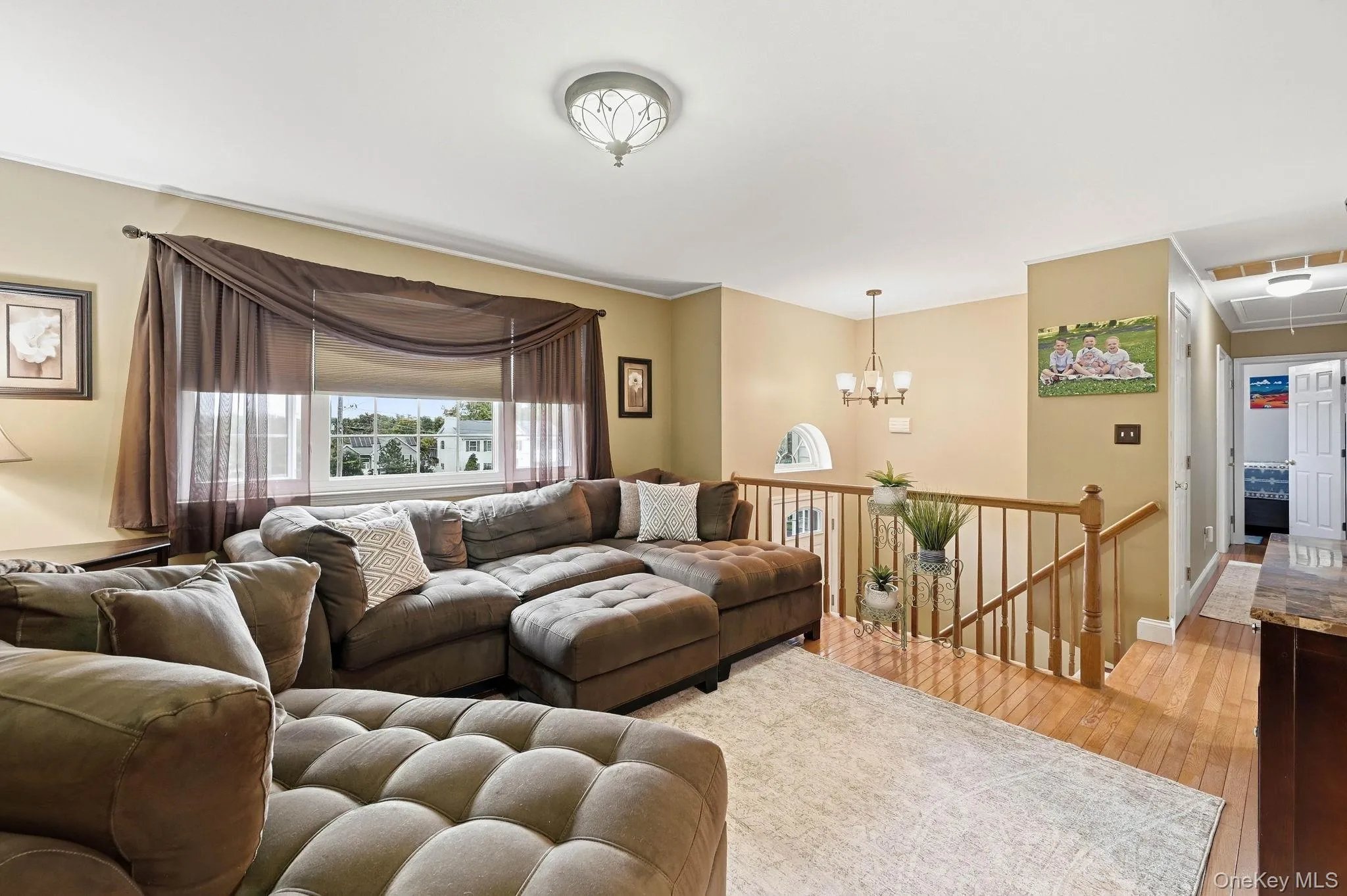 Natural light enhances the warm and inviting atmosphere of the main living space. Natural light enhances the warm and inviting atmosphere of the main living space.