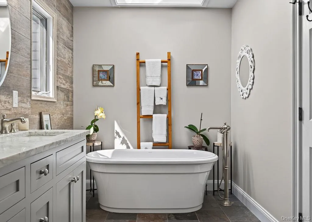 Primary, en-suite bathroom, complete with soaking tub Primary, en-suite bathroom, complete with soaking tub