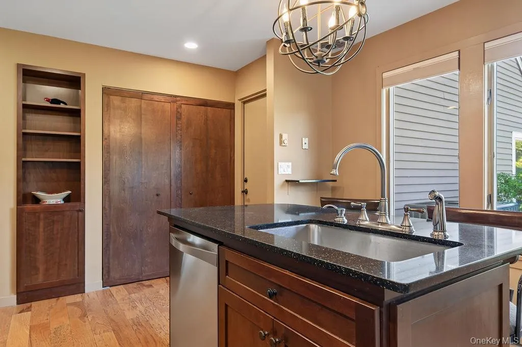 There is laundry behind the closet doors, and entry to the garage in the corner There is laundry behind the closet doors, and entry to the garage in the corner