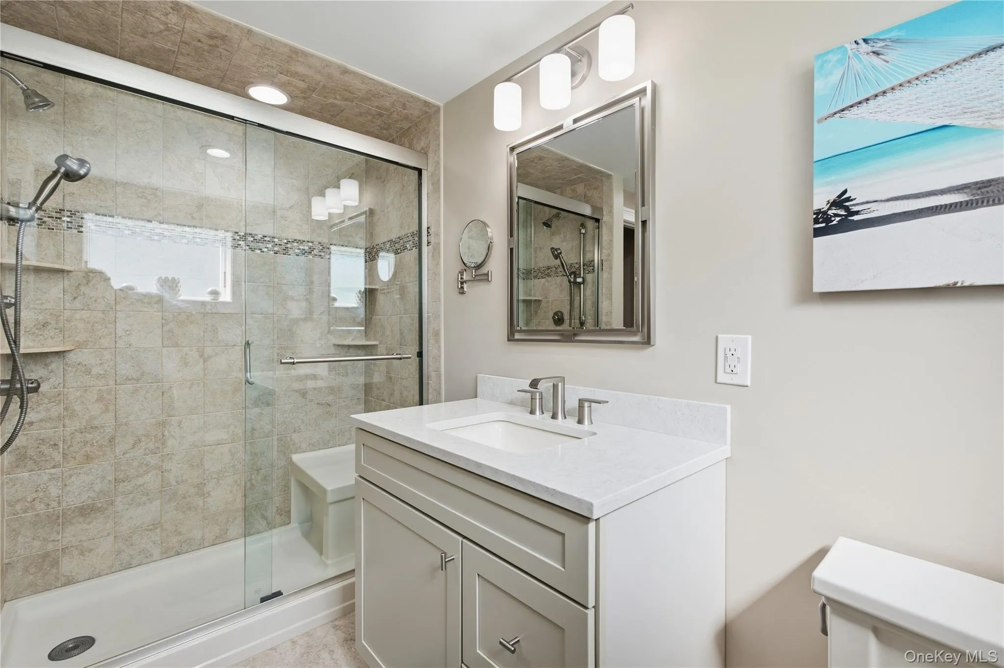 Updated bathroom with shower Updated bathroom with shower