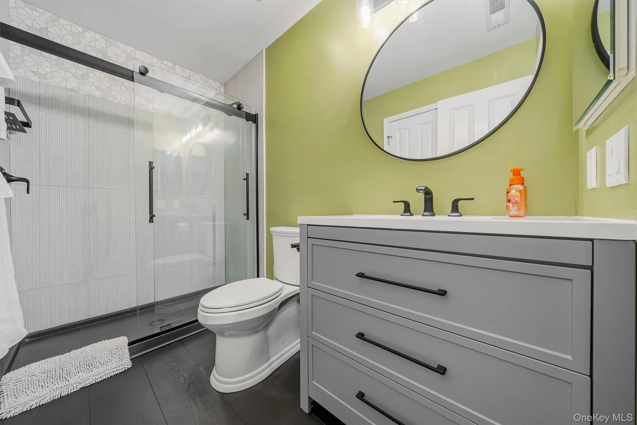 The guest bathroom has been updated with an easy access walk in shower. The guest bathroom has been updated with an easy access walk in shower.