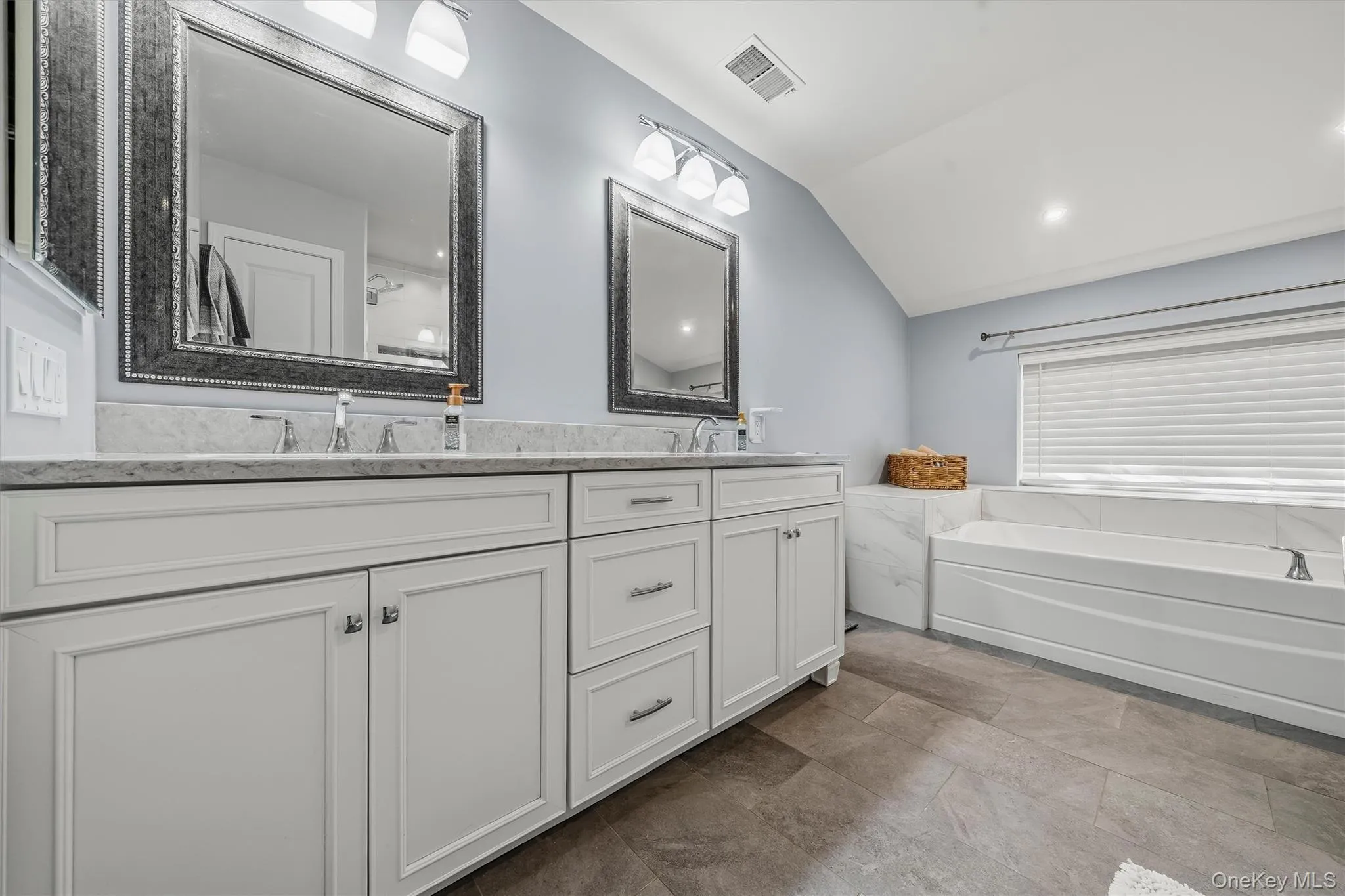 Newly redesigned with double sinks and a huge soaking tub. Newly redesigned with double sinks and a huge soaking tub.