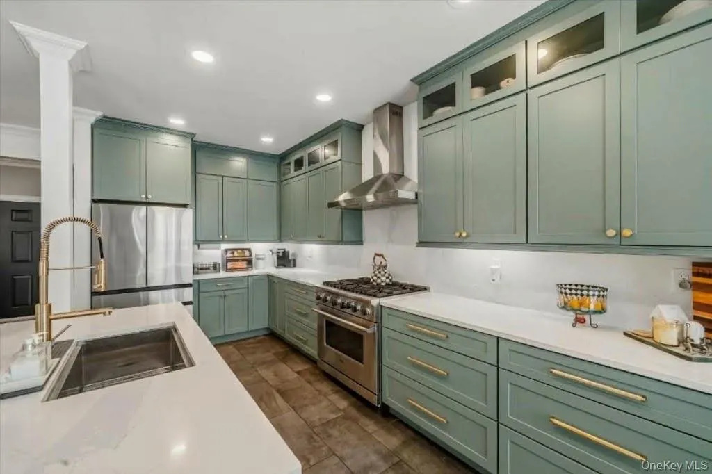 Look up at the recessed lighting and showcase glass cabinets. Look up at the recessed lighting and showcase glass cabinets.