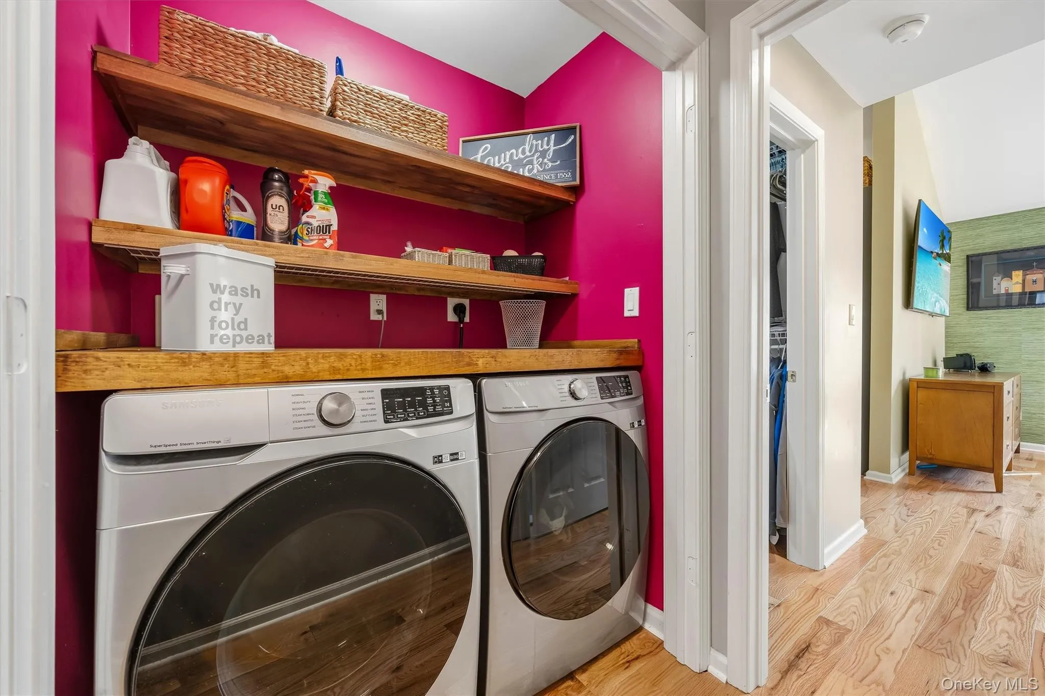 The laundry has built in folding area and storage shelves. The laundry has built in folding area and storage shelves.
