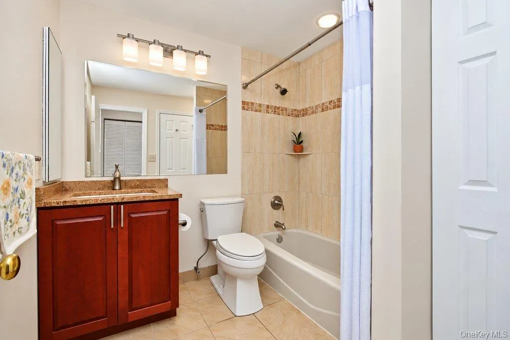 First floor Primary Bathroom has a sink with vanity and bathtub with shower combo First floor Primary Bathroom has a sink with vanity and bathtub with shower combo