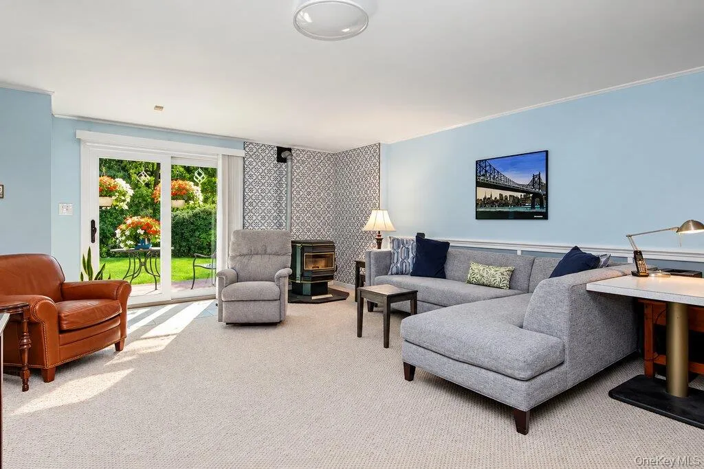 Rec room on lower level has a pellet stove Rec room on lower level has a pellet stove