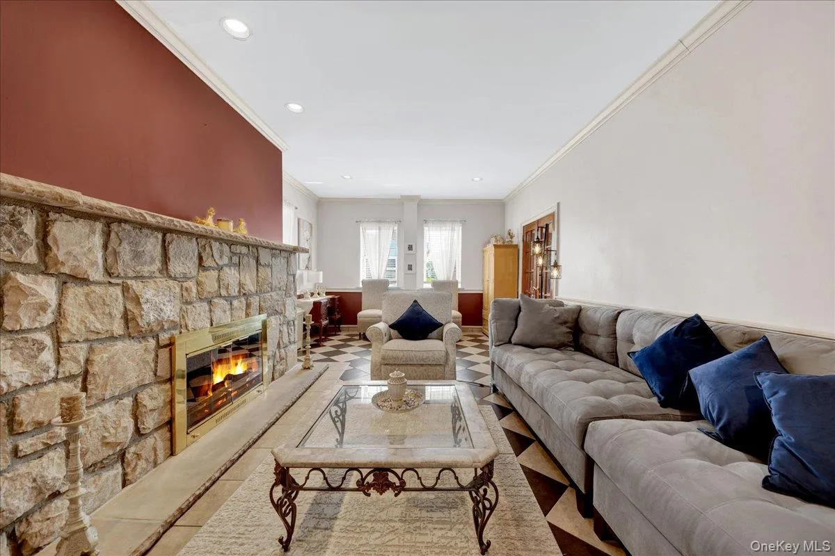 Grand living room with wood burning fireplace Grand living room with wood burning fireplace