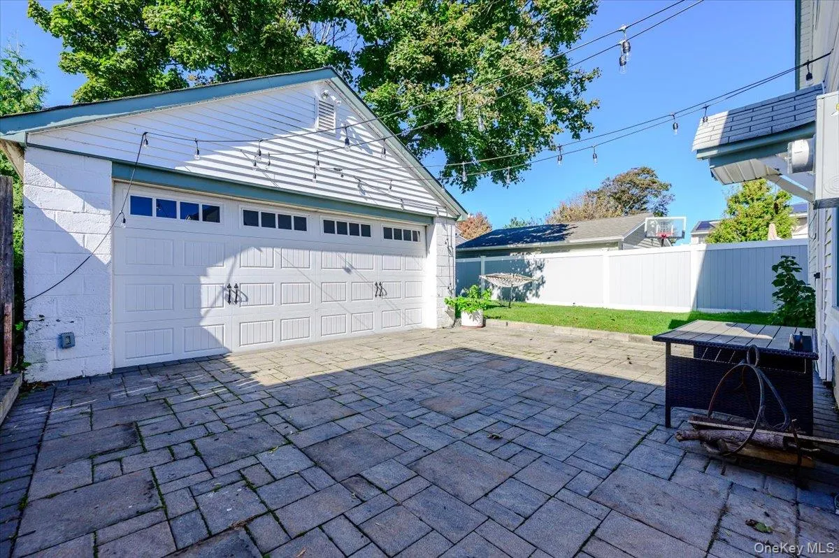 2-car garage w/paver patio area 2-car garage w/paver patio area