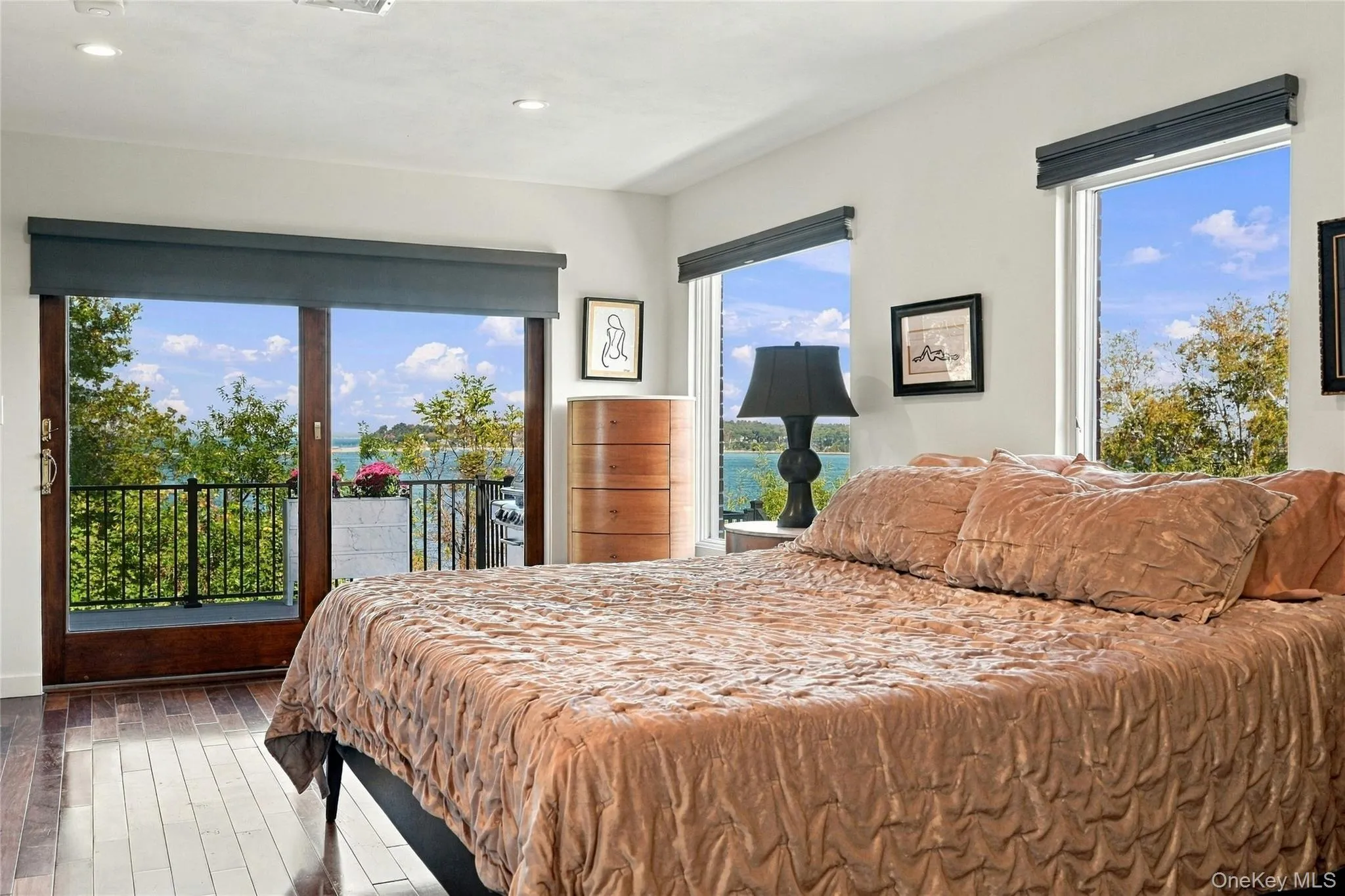 Primary Bedroom featuring stunning waterviews of Huntington Harbor Primary Bedroom featuring stunning waterviews of Huntington Harbor