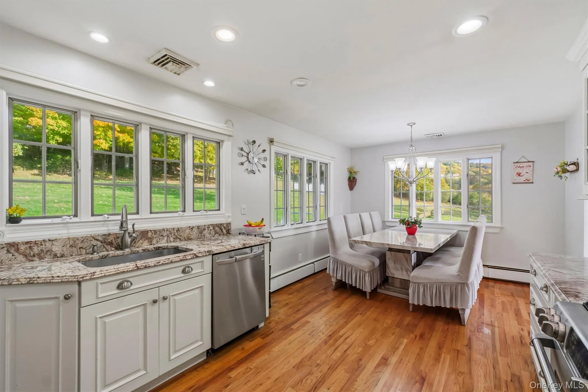 Wash dishes & meal prep with views to the backyard. Kitchen walkouts out to beautiful backyard. Wash dishes & meal prep with views to the backyard. Kitchen walkouts out to beautiful backyard.