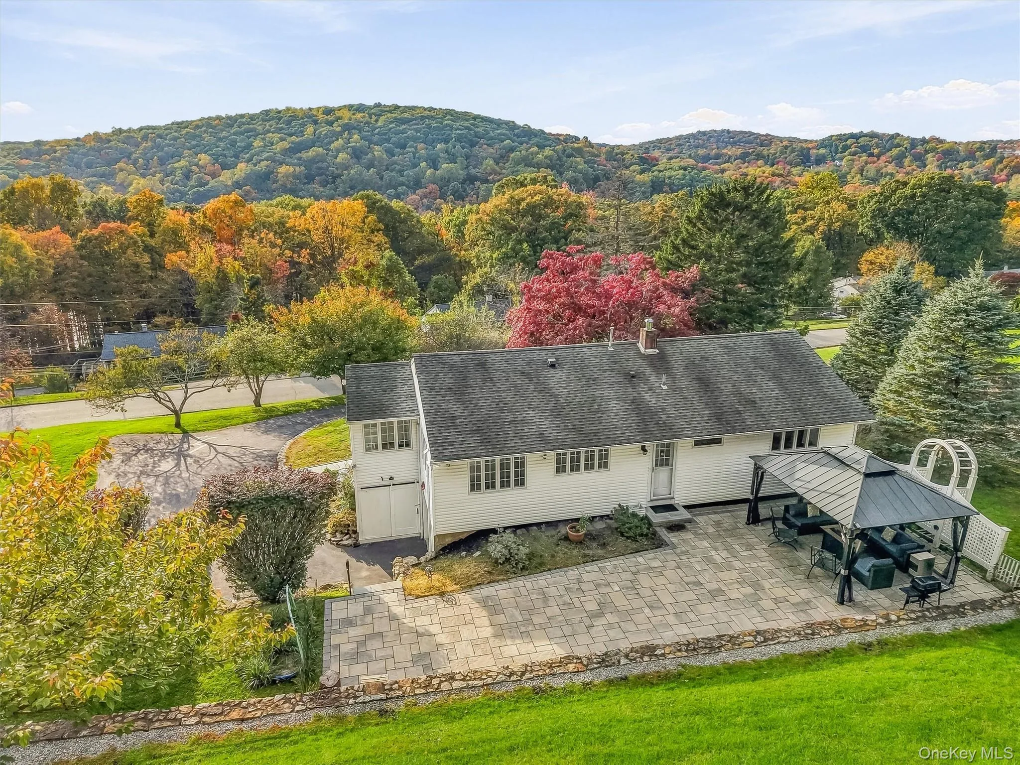 Back of home/property - look at that expansive patio! Back of home/property - look at that expansive patio!