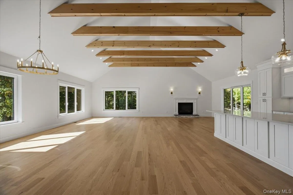 Open floor plan view with fireplace Open floor plan view with fireplace