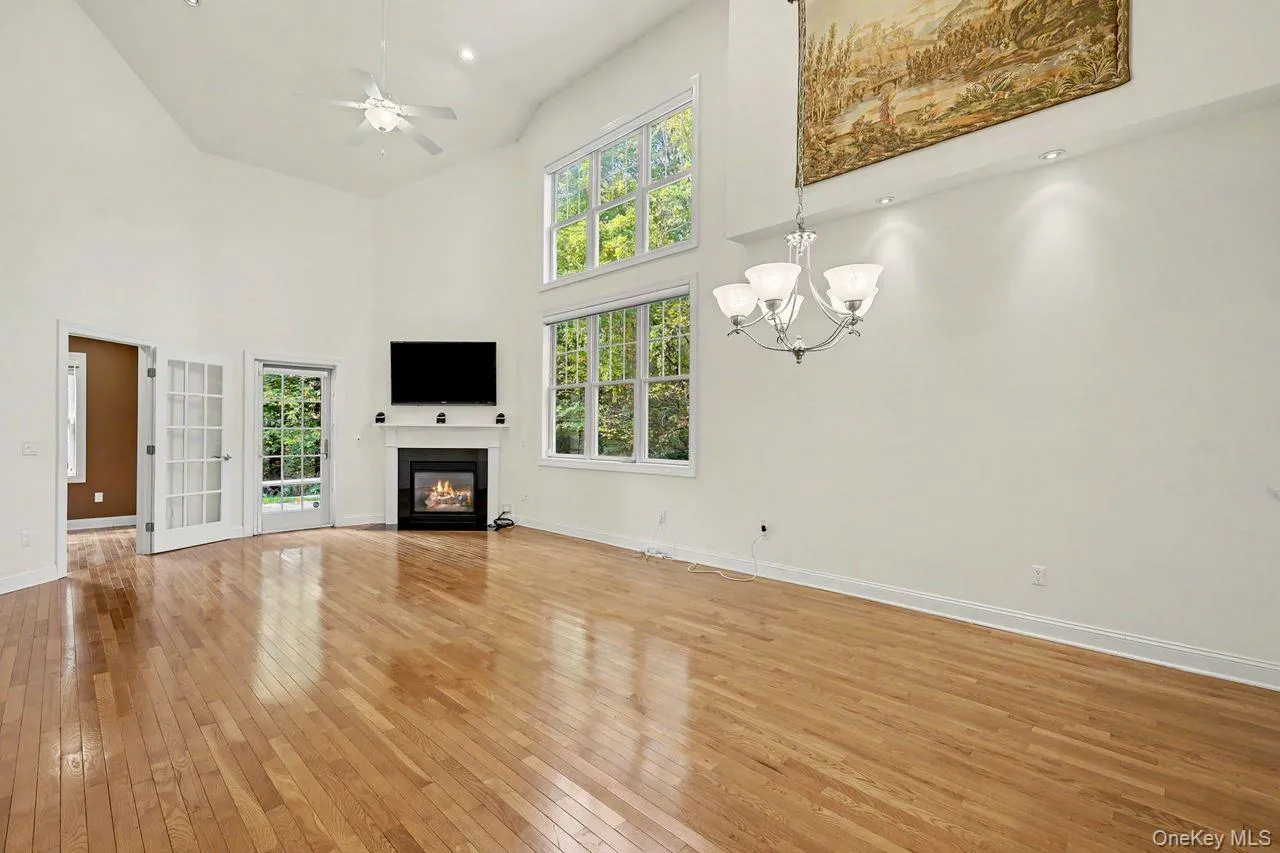 Sunfilled living dining room anchored by a gas fireplace. Sunfilled living dining room anchored by a gas fireplace.