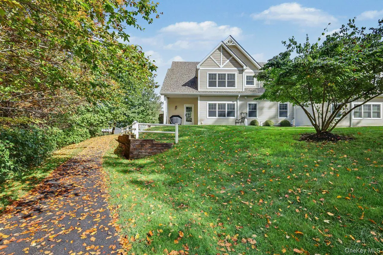 End unit with lovely landscped backyard. End unit with lovely landscped backyard.