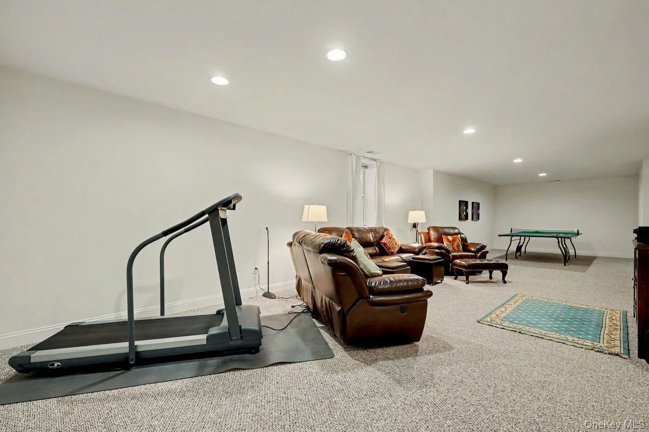 Finished basement with room for excercise equipment. Finished basement with room for excercise equipment.