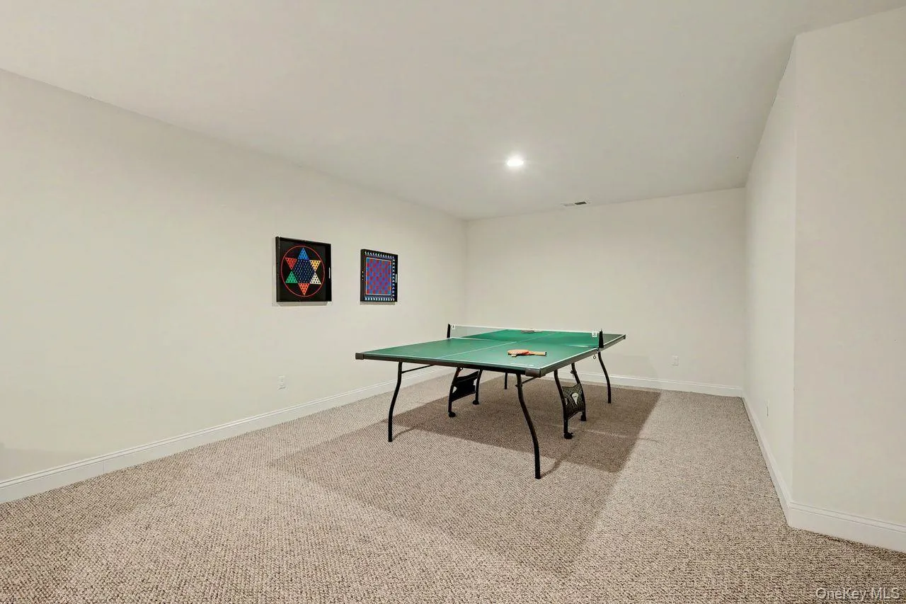 Finished lower level with plenty of room for crafts, games and everyday living. Finished lower level with plenty of room for crafts, games and everyday living.