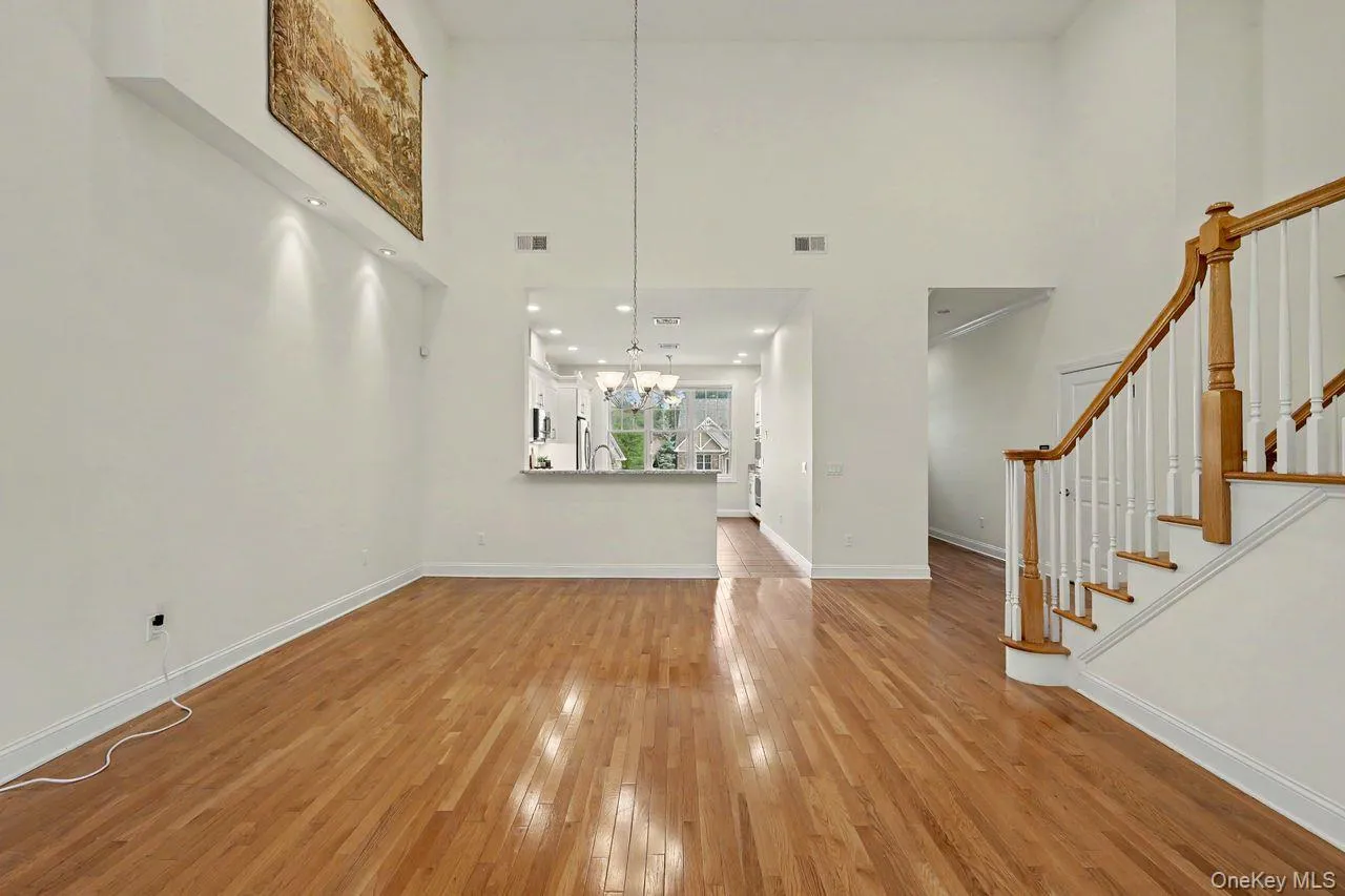 Dining area off kitchen with cathedral ceilings. Dining area off kitchen with cathedral ceilings.