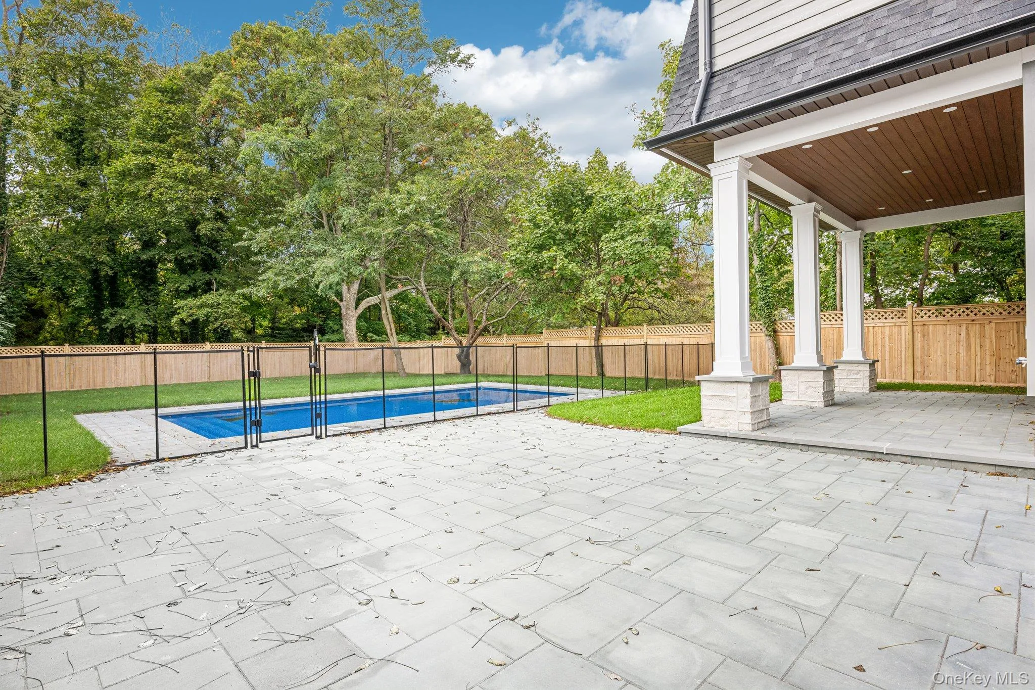 A covered rear porch overlooking the pool, an outdoor room for every season. For an evening out, Stella Trattoria on Montauk Highway is about five minutes away. A covered rear porch overlooking the pool, an outdoor room for every season. For an evening out, Stella Trattoria on Montauk Highway is about five minutes away.