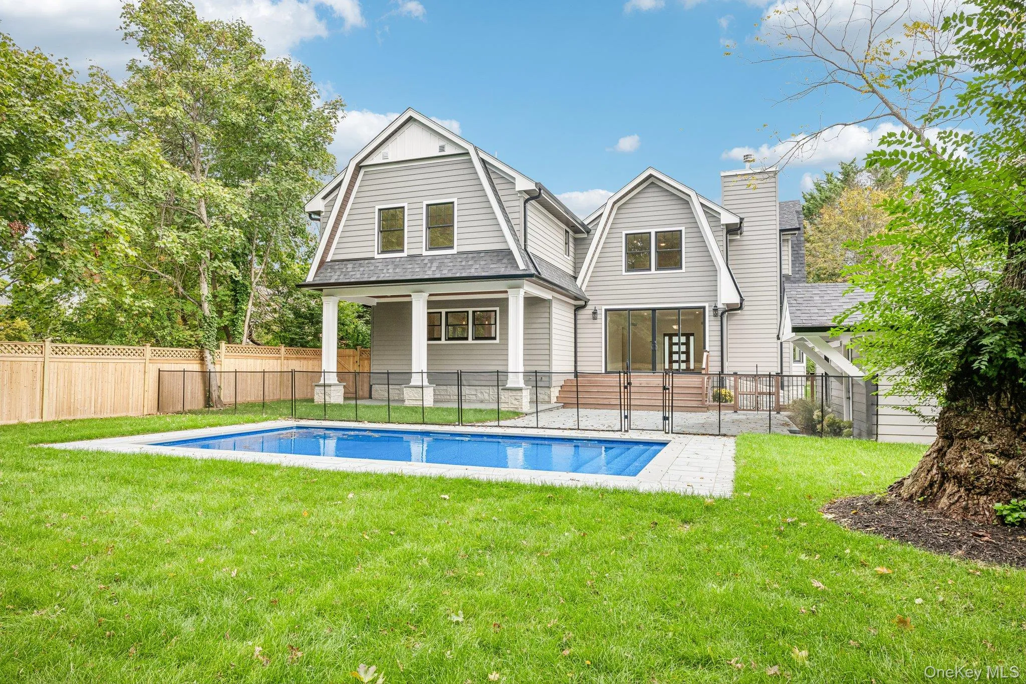 A 0.31-acre setting of new lawn, pool and patio, already green. For a night out, Buoy 35's sunset deck on the Blue Point Marina is about 0.7 miles away and open all year. A 0.31-acre setting of new lawn, pool and patio, already green. For a night out, Buoy 35's sunset deck on the Blue Point Marina is about 0.7 miles away and open all year.