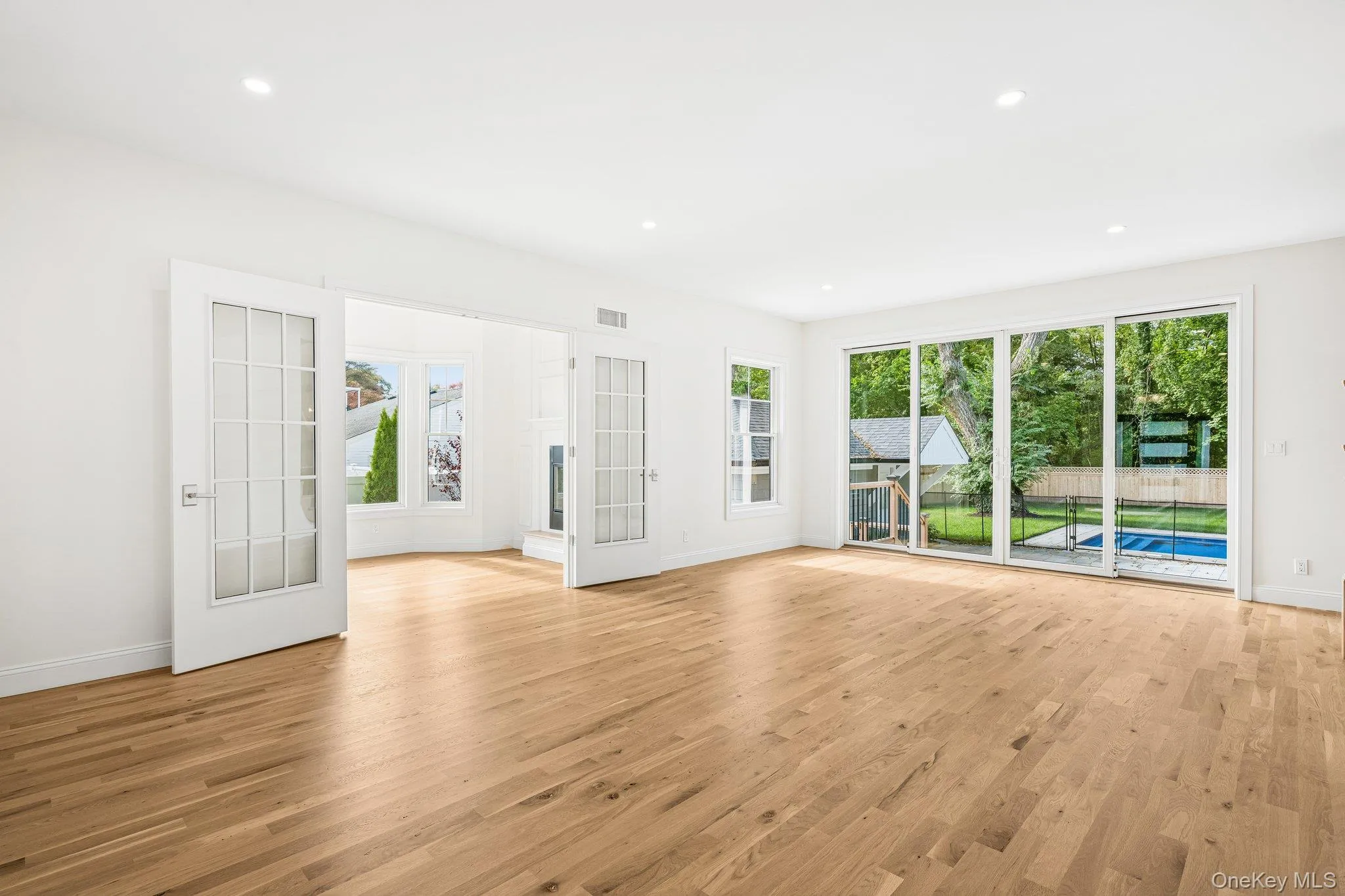An open great room with warm oak-tone floors. Mid-morning, the Nature Preserve at the end of Nelson Avenue offers paved loops you can enjoy in 30 to 60 minutes, plus a little free library. An open great room with warm oak-tone floors. Mid-morning, the Nature Preserve at the end of Nelson Avenue offers paved loops you can enjoy in 30 to 60 minutes, plus a little free library.