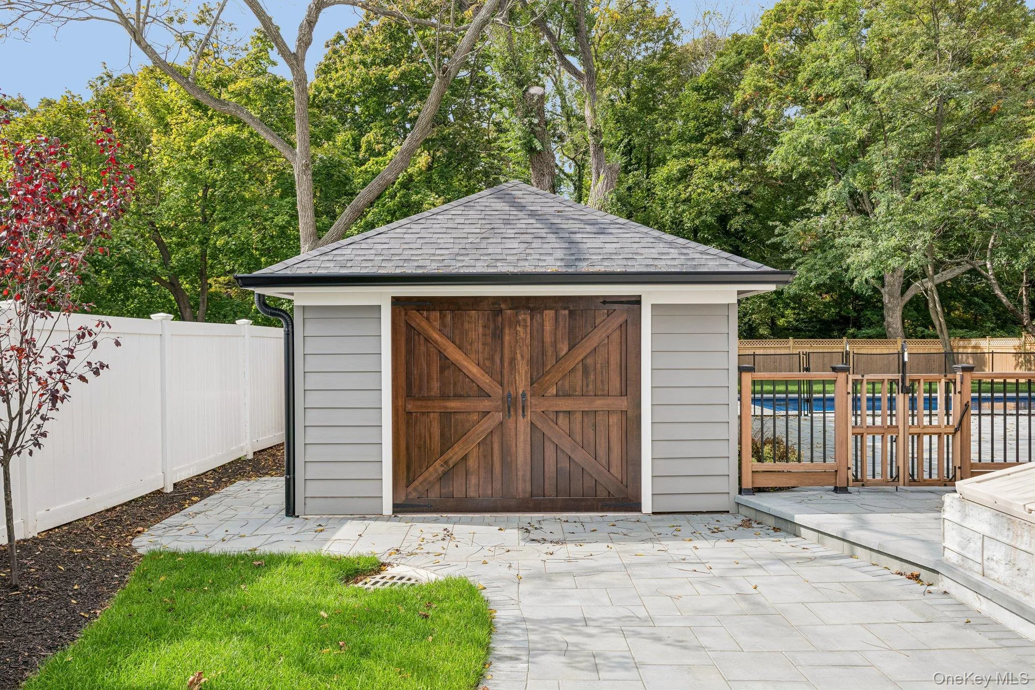 A detached garage with carriage-style door - could store kayaks, bikes and beach chairs, be used as a traditional garage or a pool house! Blue Point Dock, a favorite launch on the Great South Bay, is less than half a mile away. A detached garage with carriage-style door - could store kayaks, bikes and beach chairs, be used as a traditional garage or a pool house! Blue Point Dock, a favorite launch on the Great South Bay, is less than half a mile away.